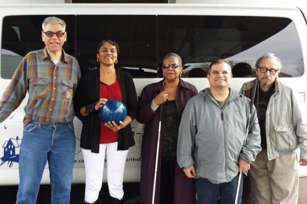 Photo of group returning from bowling trip.