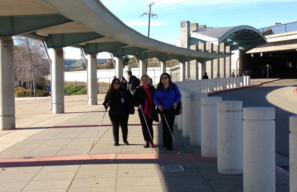 Blind People Using White Canes to Travel on BART