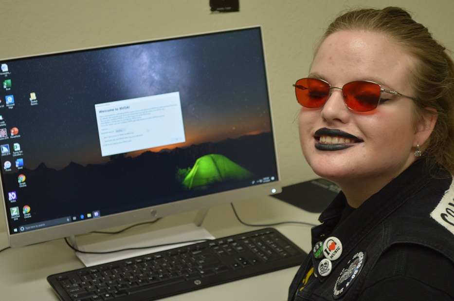 Young Woman Learns NVDA on a Computer